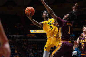 Toby Okani developing into an X factor for WVU men's hoops team